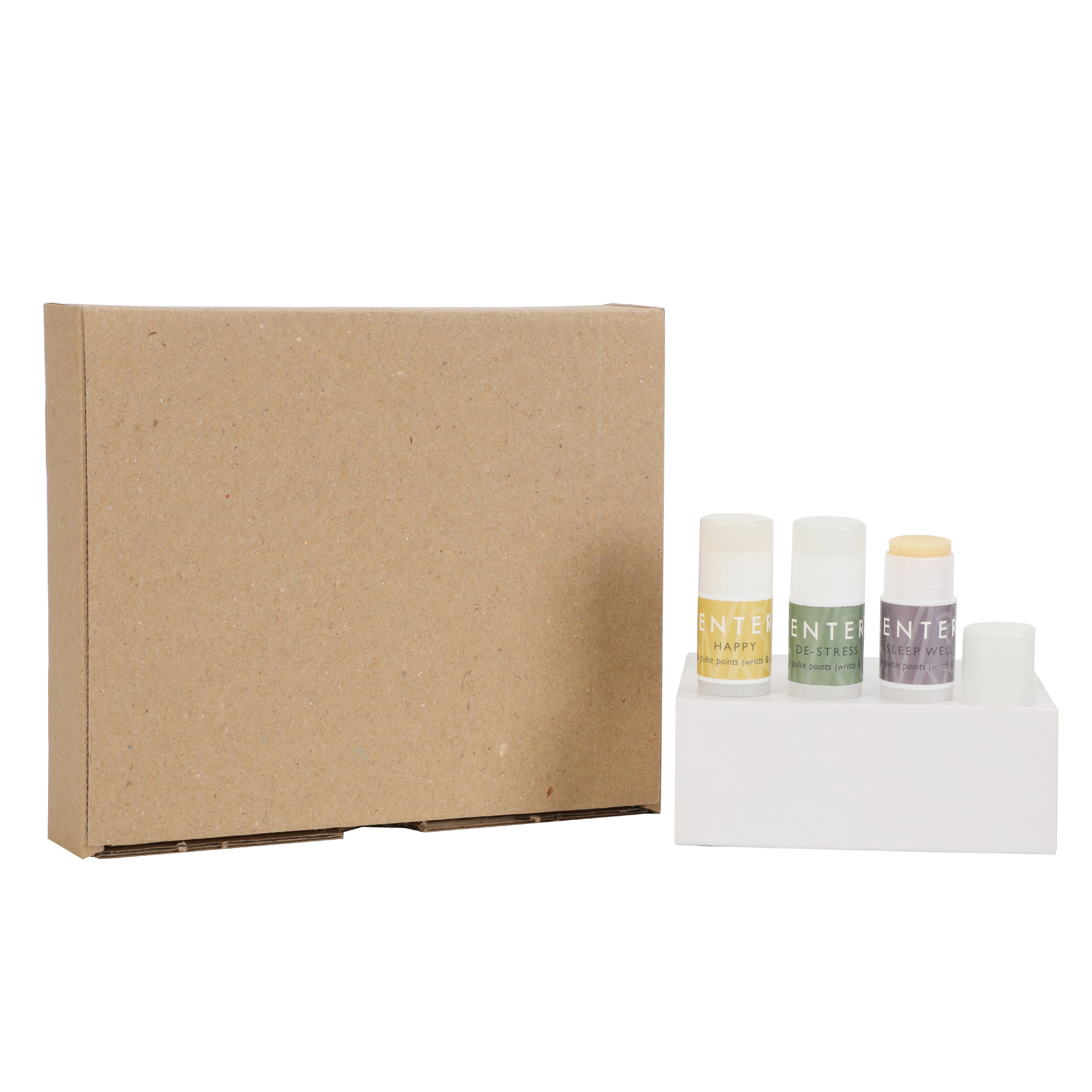 Scentered Sleep Well, De-stress and Happy Aromatherapy mini balms and Scentered branded box on white background