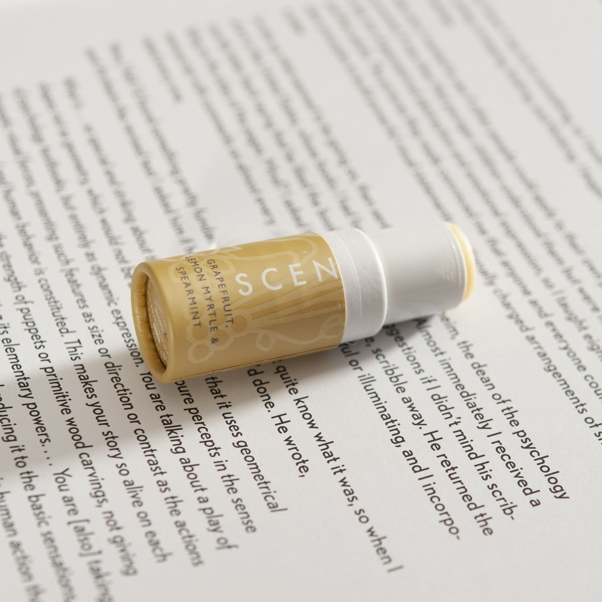 Scentered's Happy Aromatherapy Balm, an uplifting citrus-infused balm designed to boost happiness and energy.