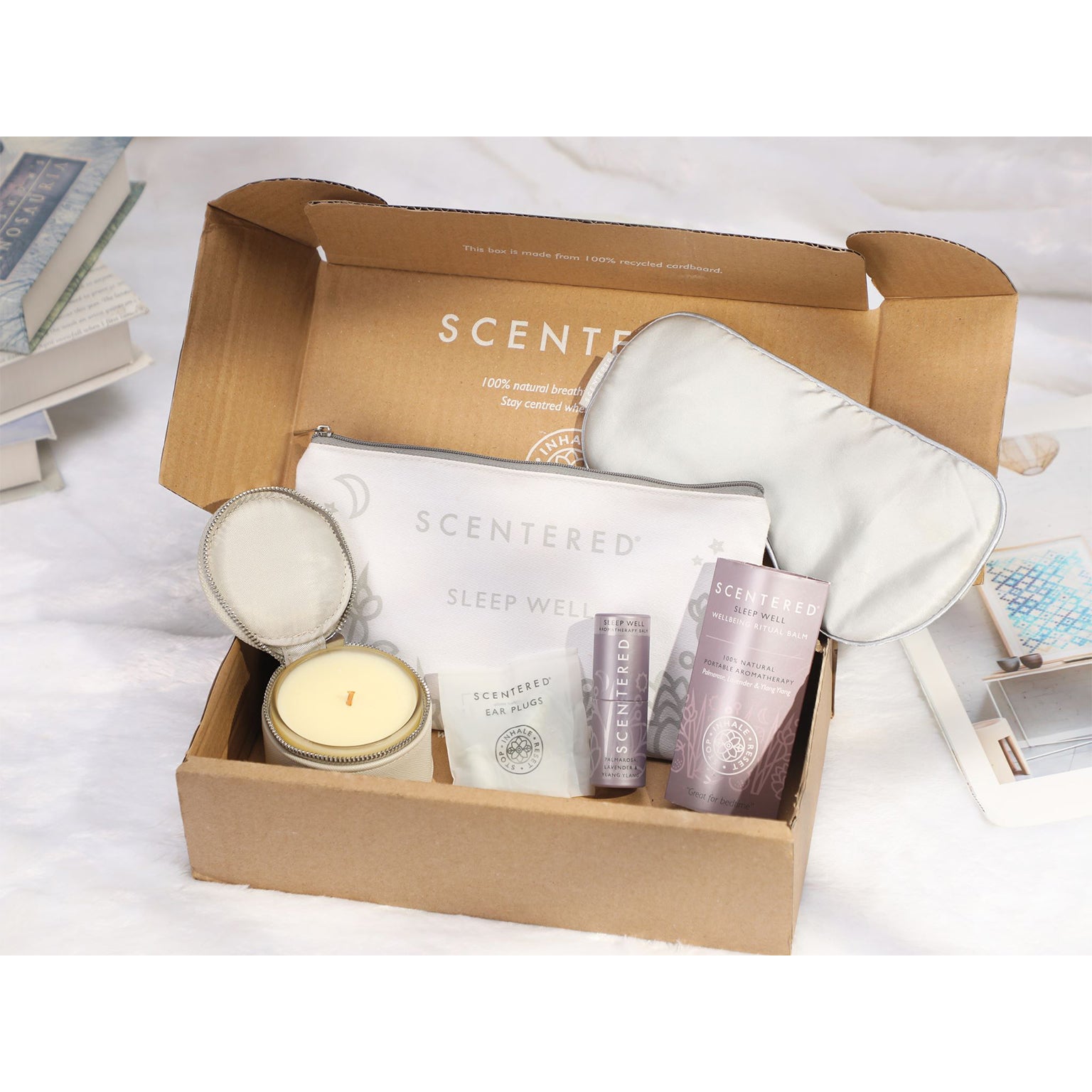 Scentered Sleep Gift box open with contents including 5g sleep balm, travel candle and silk eye mask