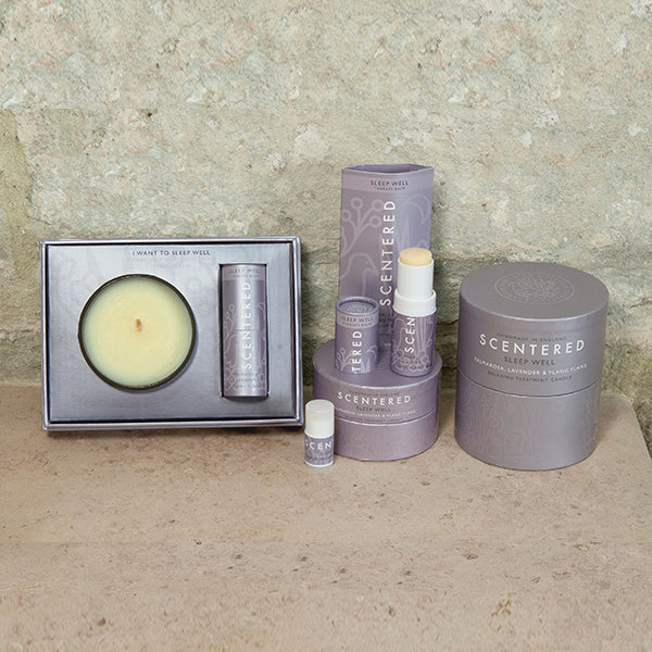 Sleep Well 220g candle with a premium essential oil blend, offering a calming, soothing aroma to help you unwind before bed. Refills are available.