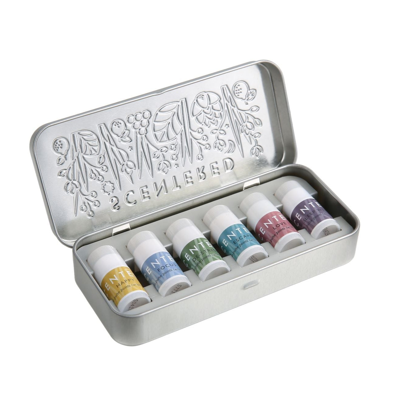 Scentered Aromatherapy Discovery Starter Tin open showing the 6 Scentered aromatherapy mini  balms inside.  These are Happy, Focus, De-stress, Escape, Love  and Sleep Well Aromatherapy Mini balm pulse point sticks 1.5g