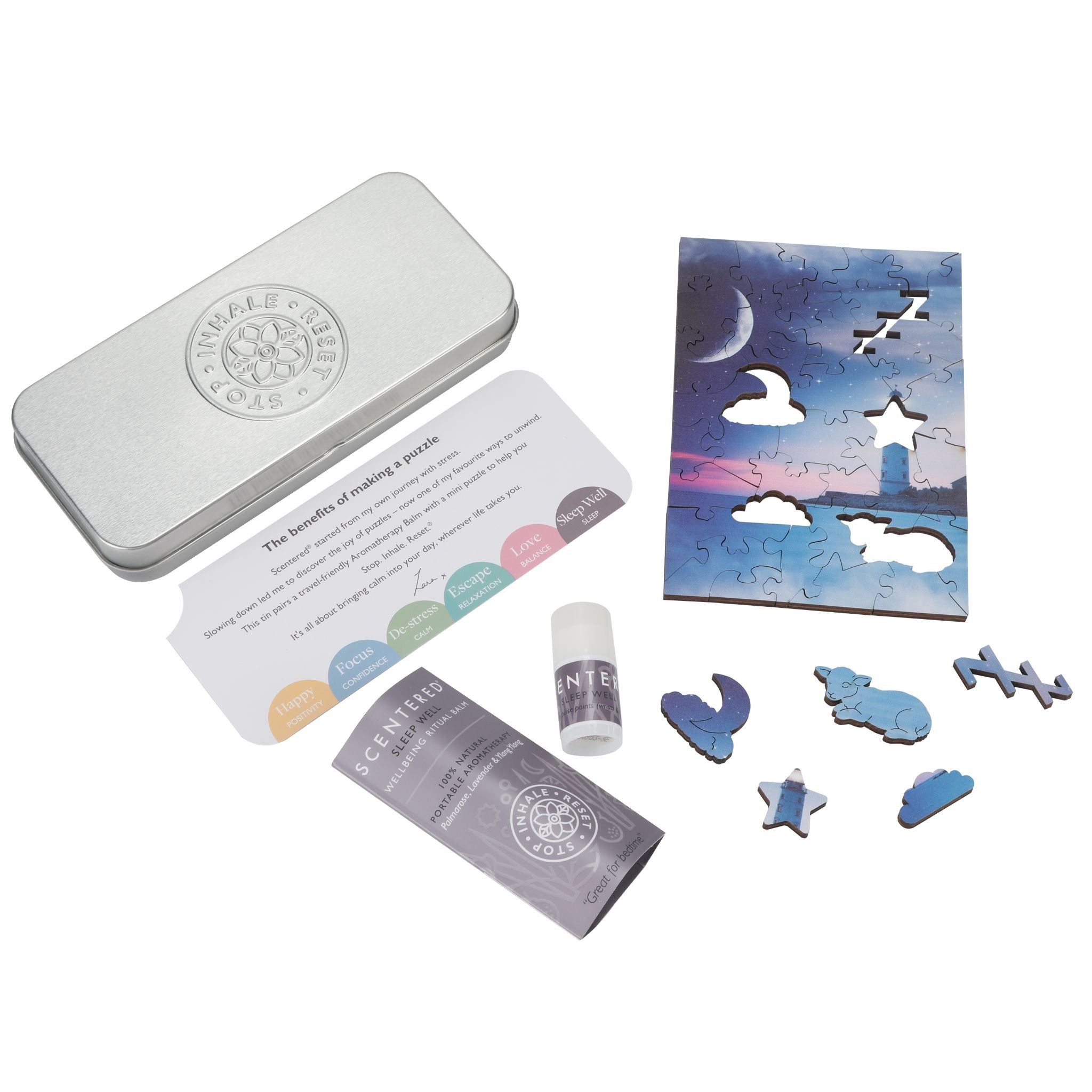 Scentered Sleep Well Puzzle set with metal reusable tin, Sleep Well mini balm instructions, and puzzle pieces on a white background
