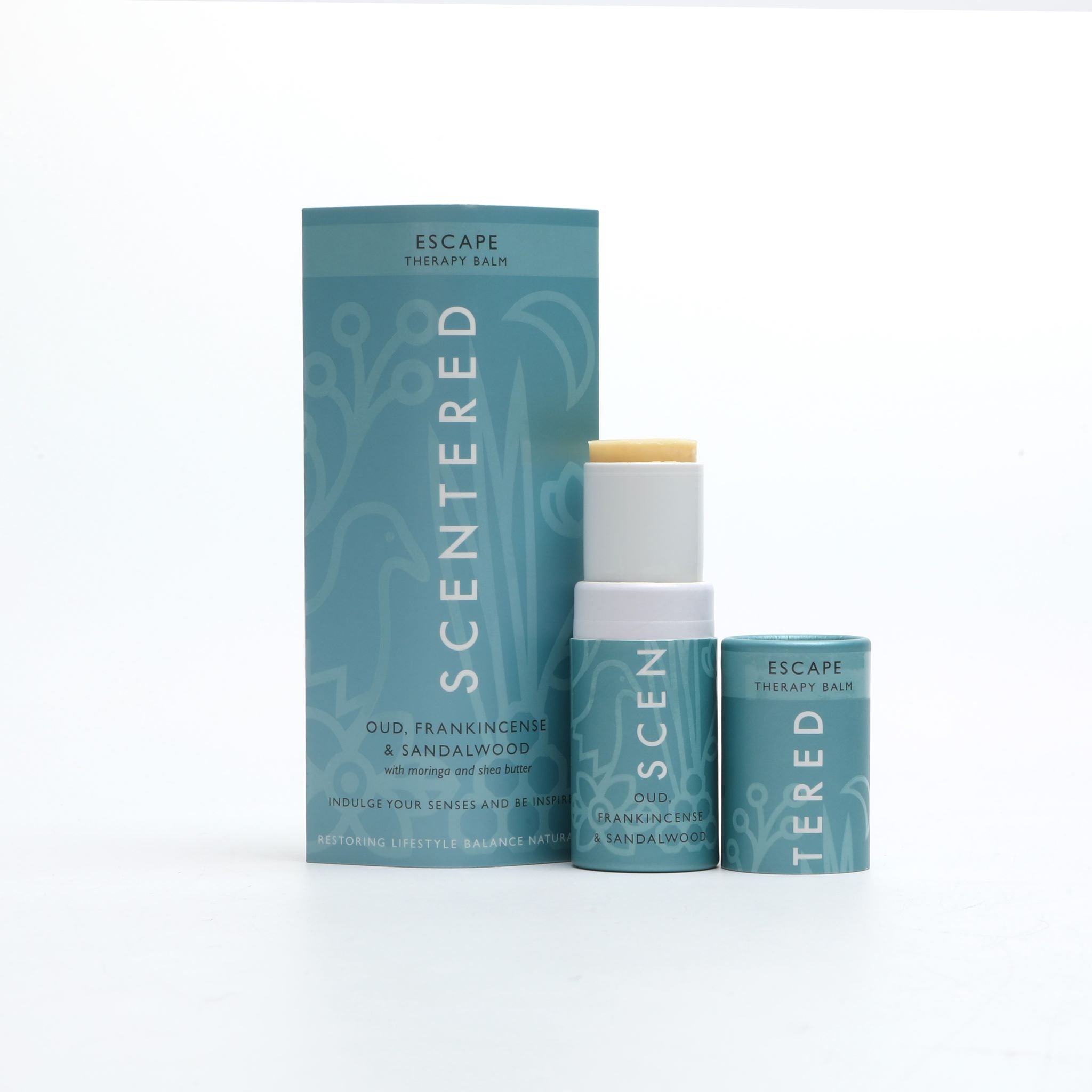 Escape Aromatherapy Balm with cap off and twisted up with eco sleeve packaging. Natural Aromatherapy Balm for Stress Relief – Perfect for Travel
